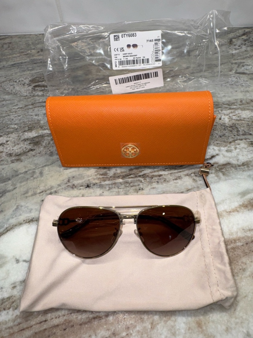 Brand new Tory Burch aviator sunglasses with brown gradient lens